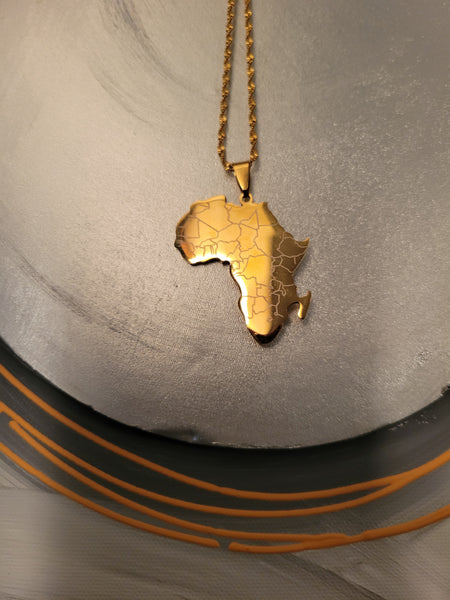 African map pendant in gold